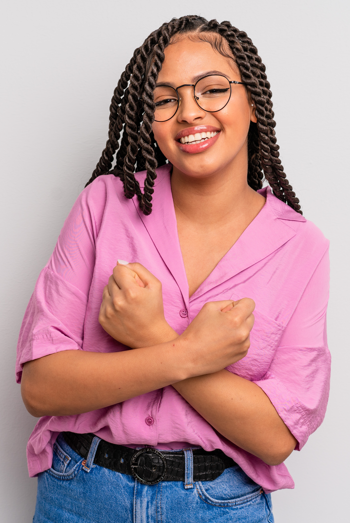 Beautiful smiling young woman crochet braids